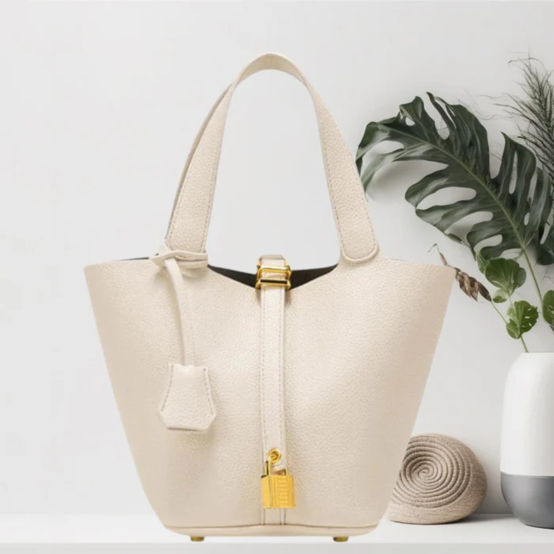 Leyna Handtas | Stoere leren tas met een gouden sluiting