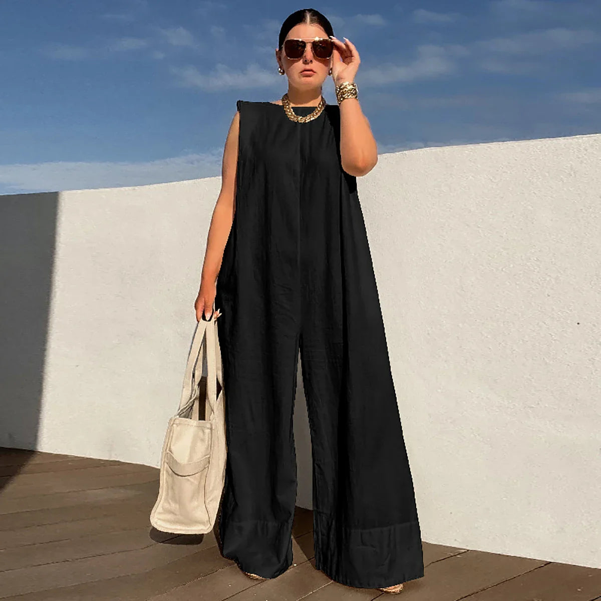 Ingrid mouwloze jumpsuit | Stijlvolle, casual jumpsuit voor dames met wijde pijpen en oversized pasvorm